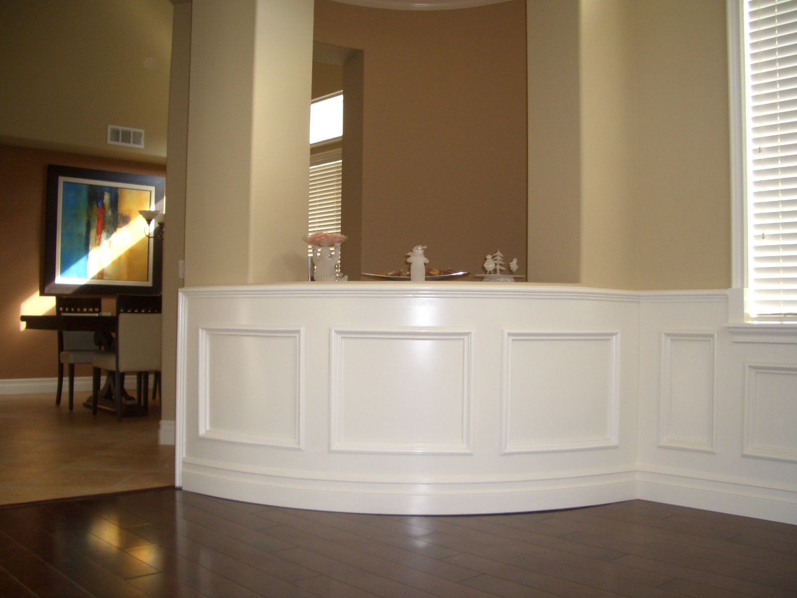 Raised panel wainscoting on a curved wall